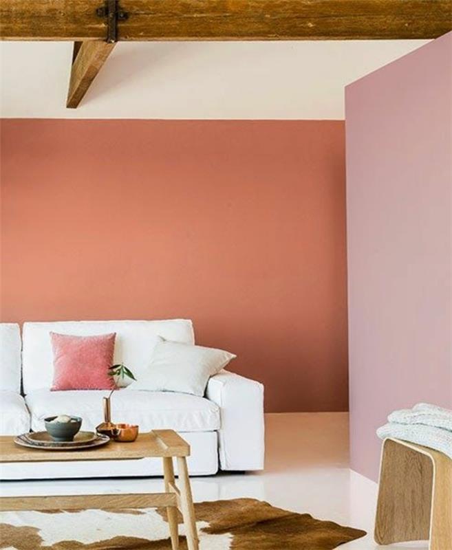 kaip suderinti interjero spalvas-blyškiai rožines sienas-gyvūnų odos kilimėlius