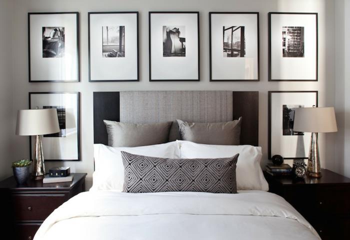 enobarvna spalnica, črno -bele slike, dva senčnika, nočne omarice iz temnega lesa