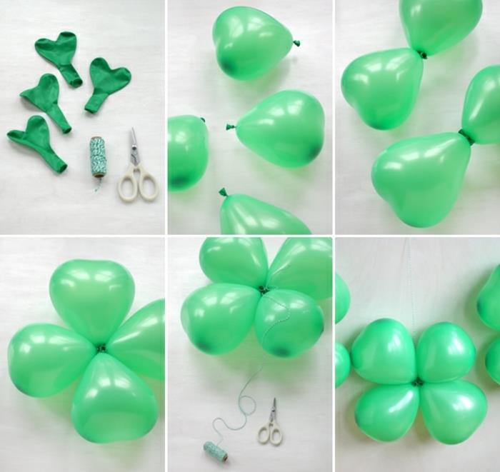balionų dobilų, sugrupuotų po du, žalių balionų, suskirstytų į keturių lapų dobilus