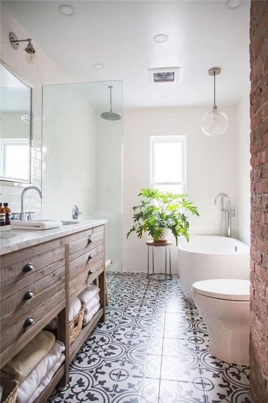 Leseni in kovinski stol, sivo -bela kopalnica, moderna kopalniška ideja v nordijskem slogu z lesenim pohištvom in zelenimi rastlinami za dekoracijo