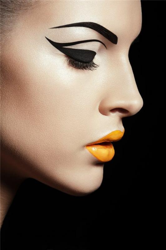 make -up trik s črnim svinčnikom in rumenimi ustnicami sublimirane obrvi s črnim svinčnikom zelo debele črte