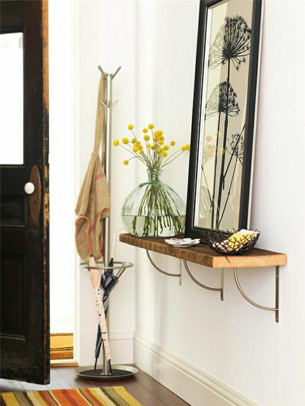 konzolno-leseno-vhodno-vhodno-pohištvo-parket-tla-obarvano-preproga-steno-belo-cvetje