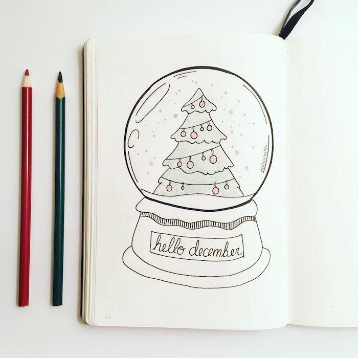İçinde Noel ağacı olan orijinal kağıt ağırlığında Noel topu, bir Noel Baba çizin, basit çizgilerle çizmeyi öğrenin