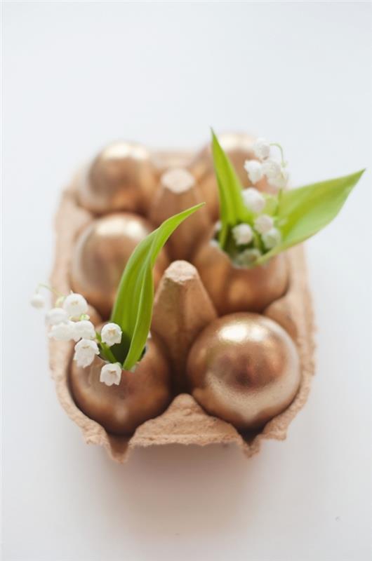 kaip padaryti dekoratyvinę vazą, naudojant tuščias kiaušinių lukštus, papuoštus aukso atspalvio purškiama spalva