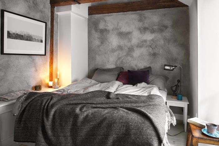 Skandinavsko vzdušje v sobi, ki je pobarvana v kremenčevo sivo barvo, okrašena z lesenim pohištvom, ogljeno siva karirana z resicami