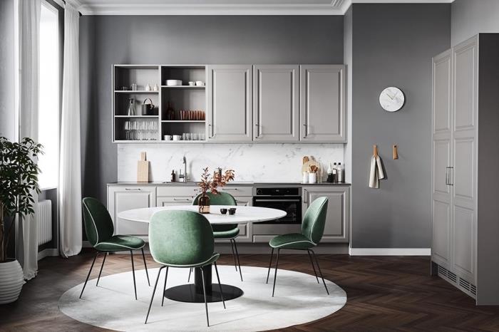 Modern bir mutfakta renkleri nasıl birleştireceğinize dair fikir, gri duvarlı ve beyaz halılı bir mutfakta çağdaş iç tasarım