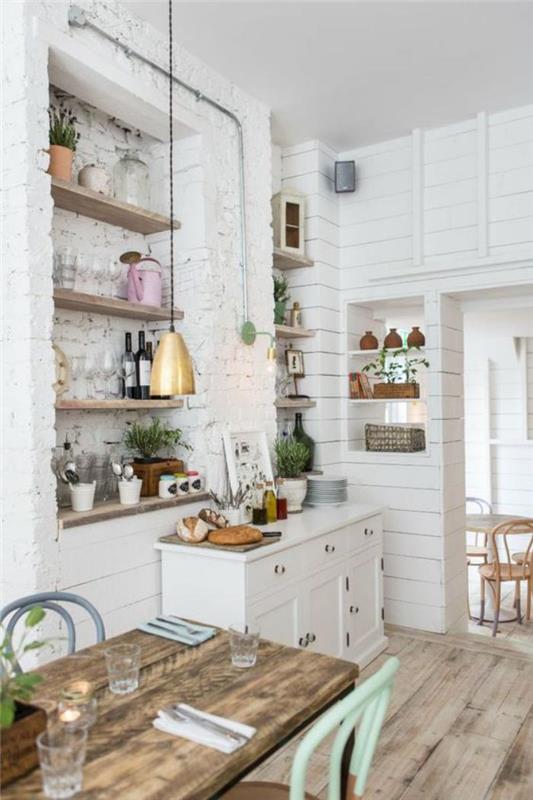 baltos ir medinės virtuvės-baltos plytų sienos-medžio ir metalo stalas
