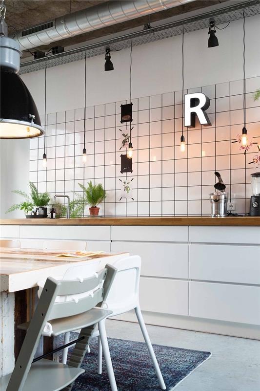 endüstriyel dekoru İskandinav atmosferiyle birleştiren zarif tasarımlı siyah beyaz mutfak