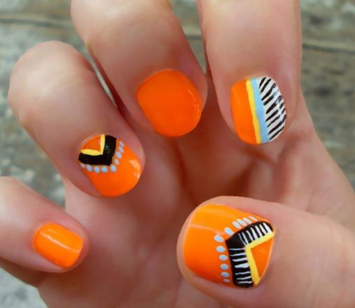 Deco-nail-aztec-nail-art-on-orange-lak