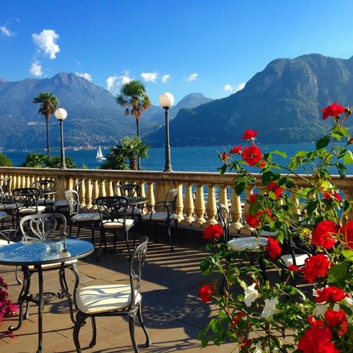 apsilankyti Italijos ežeruose-ežero ežere-rutard-Bellagio-italy-restorane-raudonos gėlės