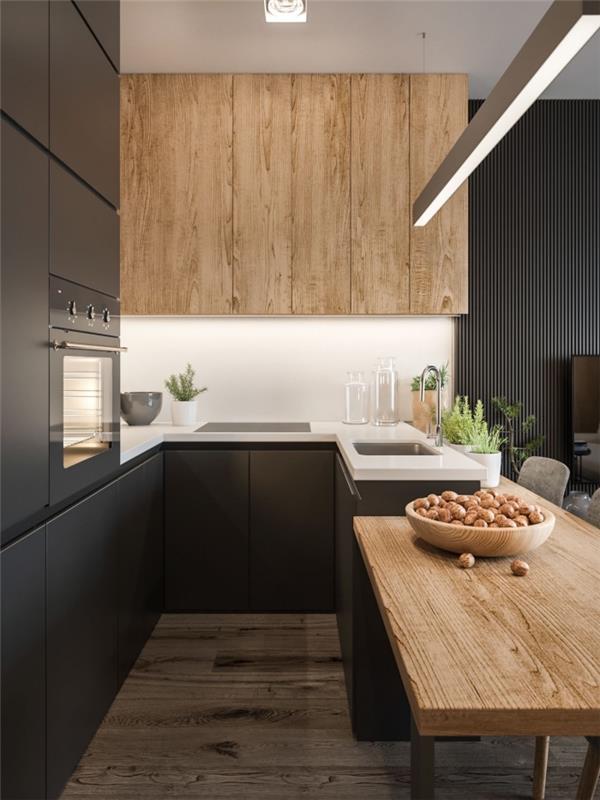 Kuhinjska postavitev v obliki črke U z lesenimi zgornjimi enotami brez ročajev in osnovnimi enotami v mat antracitno sivi barvi