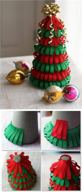 Kalėdinė dekoracija, kurią galite pasidaryti patys, Kalėdų eglutė, pagaminta ant kartono kūgio, ant kurios raudonos ir žalios spalvos užklijuotos mažos spalvoto popieriaus juostelės, viršuje papuošta aukso spalvos dovanų pakuotės lanku