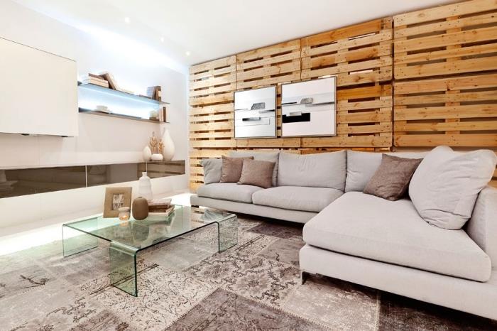sodobno notranje oblikovanje v beli dnevni sobi s steno palete, lesena obloga za notranjo opremo