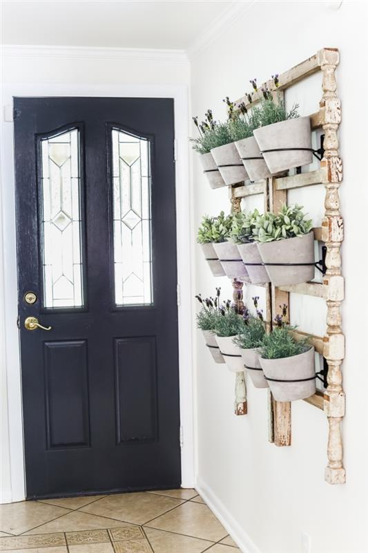 dekoracija sobnih rastlin, kako okrasiti steno hodnika z rastlinami, ki visijo v lončkih leseni okvir