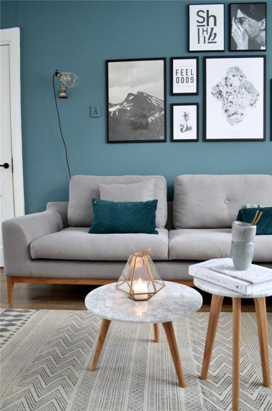 anties mėlynos spalvos svetainės dekoras, pilka soga, skandinaviški maži stalai