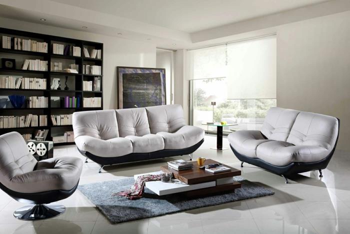 modernus svetainės dekoras, patogios sofos, pilkas kilimas, modulinis svetainės stalas