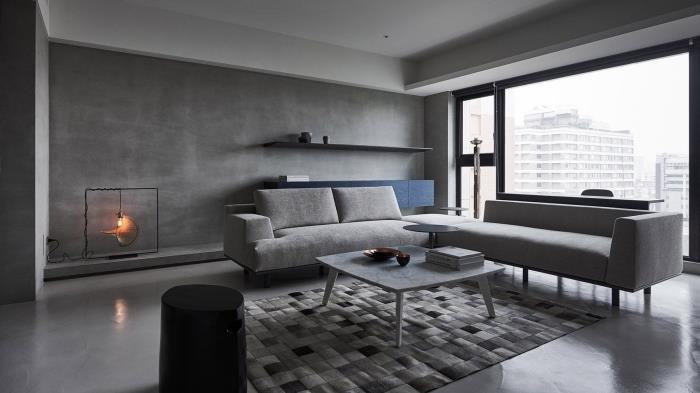 dairenize gri rengi nasıl entegre edersiniz, siyah bir tabure ile açık gri renkli tasarımcı oturma odası mobilyaları