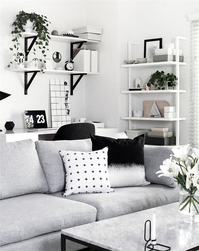 siyah, gri ve beyaz İskandinav dekoru, mermer tablalı metal masa, gri kanepe, gri, beyaz ve siyah minderler, dekorasyon aksesuarları için duvar rafı