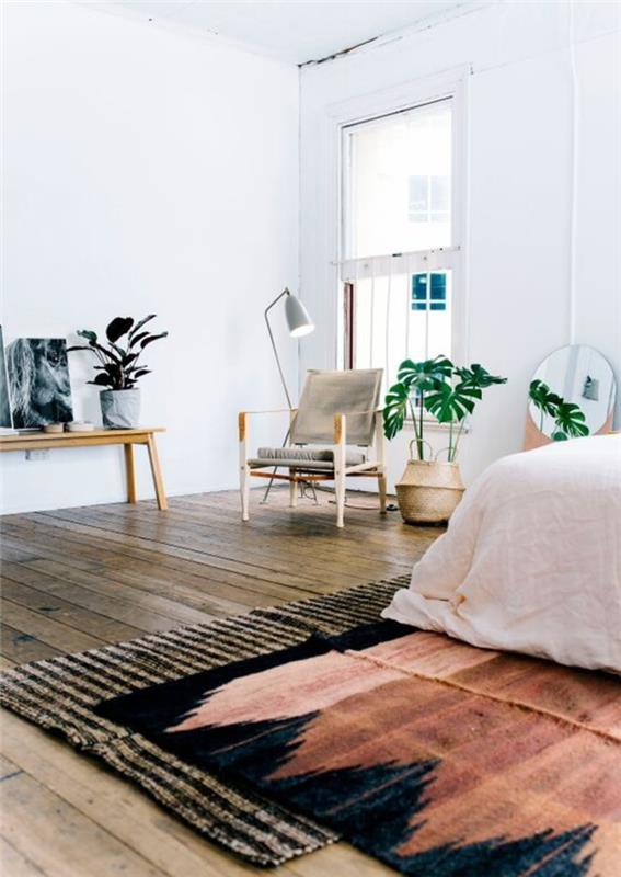 minimalist dekora sahip bohem şık bir yatak odası, samimi bir bohem şık atmosfer