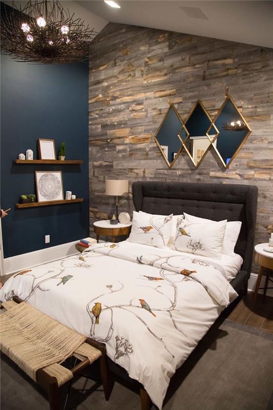 originalus mažo suaugusiųjų miegamojo apdaila, dizaino metalinis lubų šviestuvas, naftos naktiniai mėlyni dažai sienų apdailai