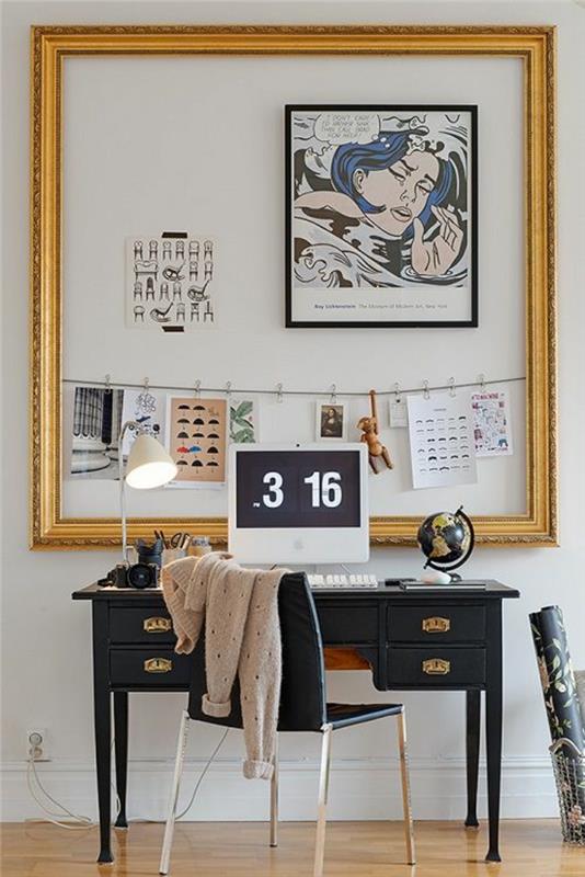 moteriško stiliaus baldai su komiksų motyvais, studentų miegamojo dekoras, juodas Renesanso stiliaus stalas su auksinėmis rankenomis, didelis tuščias paveikslų rėmas, skirtas nuotraukoms ir užrašams pastatyti virš stalo