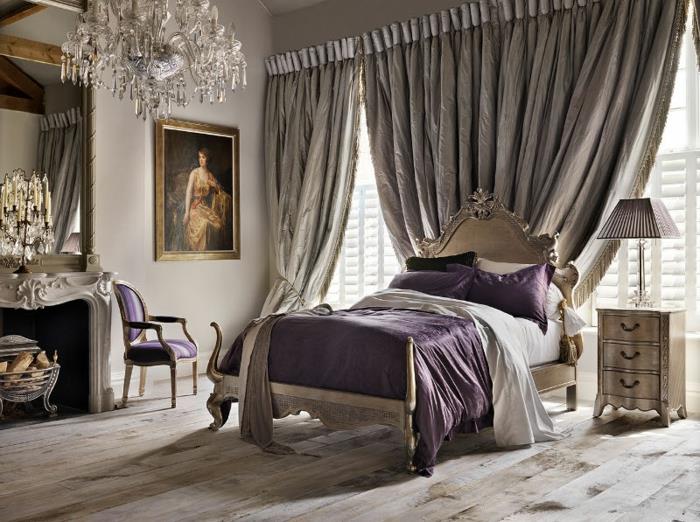 postavitev spalnice, kamin z mavčno dekoracijo, bele stene, vijolični stol