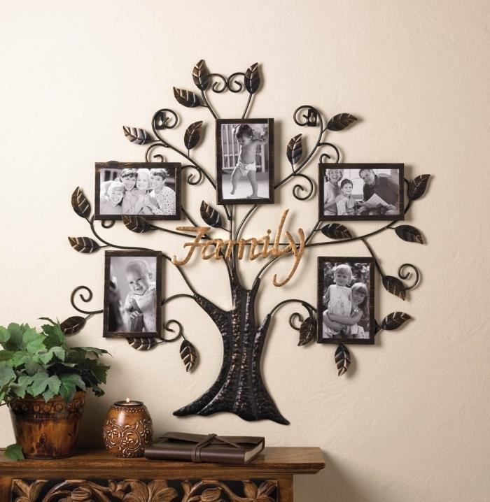 senas spintelės modelis iš tamsaus žaliavinio medžio, dekoruotas gėlių vazonu ir mediniu žvakių laikikliu, metalo sienų dekoravimo pavyzdys šeimos medžio pavidalu su nuotraukų rėmeliais