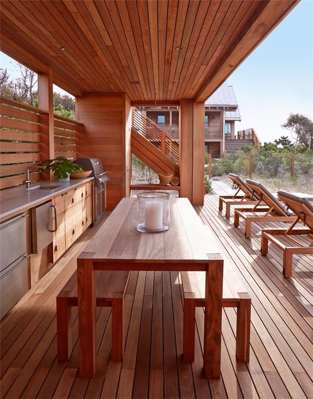 sodobno oblikovanje zunanje kuhinje moderna zunanja jedilna miza lesena jedilna miza klop lesena zunanja LED osvetlitev