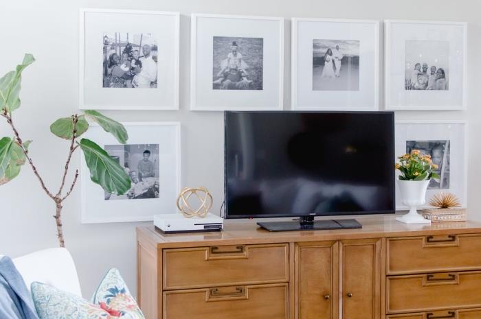 duvar resimleri için tv çerçeveleri arkasında tasarım deco duvar beyaz ve siyah mobilya ahşap yeşil bitki beyaz koltuk
