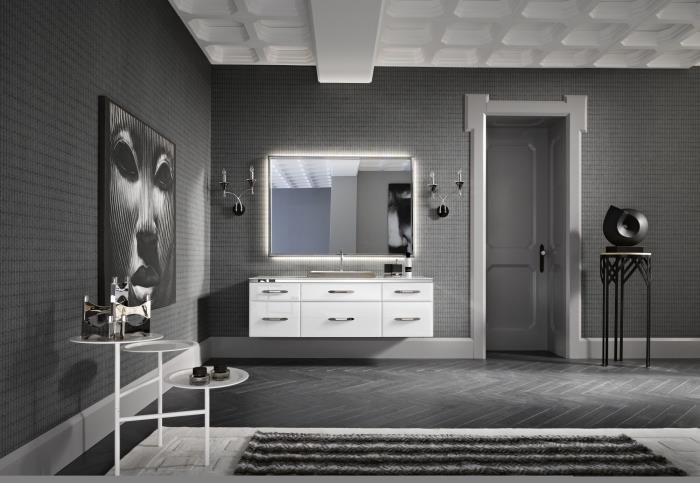 oturma odası veya banyo dekorasyonunda gri ile hangi rengin ilişkilendirileceği fikri olarak beyaz dolap dolabı ve siyah yuvarlak masa