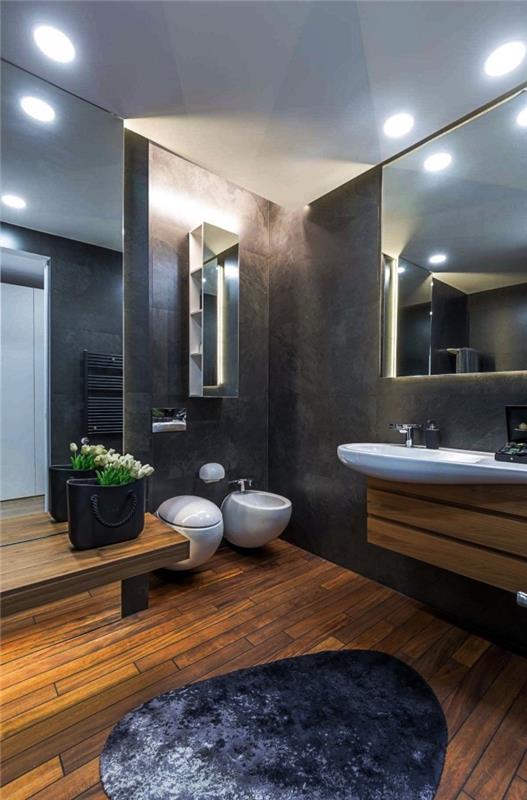 kaip sutvarkyti šiuolaikišką vonios kambarį, vonios kambario idėjos su anglies pilkomis sienomis su medžio imitacijos lentų grindimis