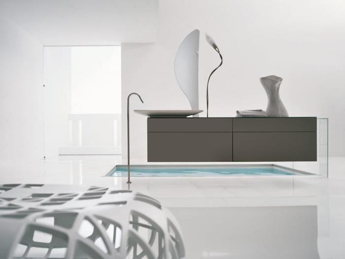 Nötr renkler ve geometrik şekillerde mobilyalarla çağdaş bir tarzda lake banyo karoları, rafine ve minimalist dekor