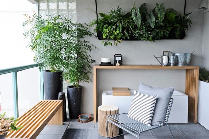 oblikovanje terasa sodoben slog leseno pohištvo klop cvetlični lonec vrh antracitno siva stena visi za rastline v črno barvanem lesu
