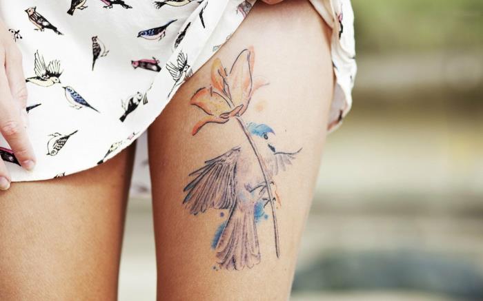 Mandala dövmesinin anlamı göğüs dövmeleri takdire şayan kuş ve çiçek renkli dövme