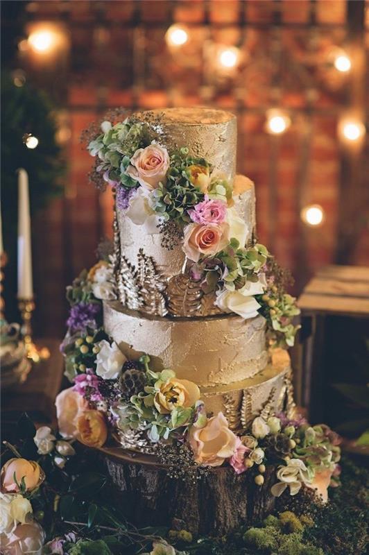 Gražiausias pyragas pasaulyje, šedevrinio torto su gėlėmis ir auksiniu viršeliu įvaizdis, cukraus pastos menas