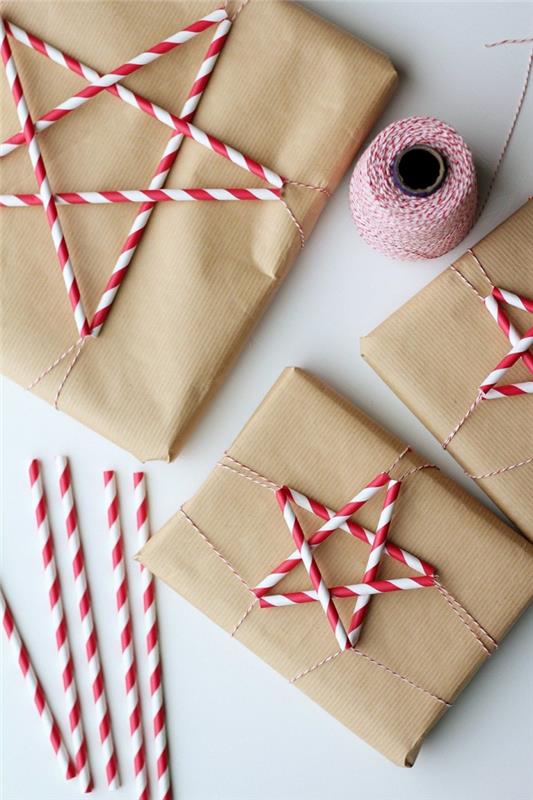 Kraft kağıda hediye paketi ve kırmızı ve beyaz Noel yıldızı payetleri, kraft kağıda hediye paketi üzerine dekor toplama
