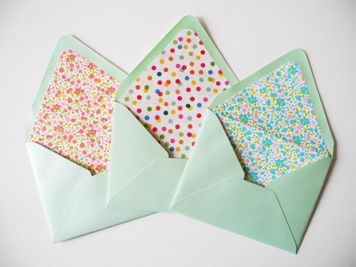 zarf katlama, çiçek ve geometrik desenlerle renkli kağıtla süslenmiş yeşil zarf şablonu