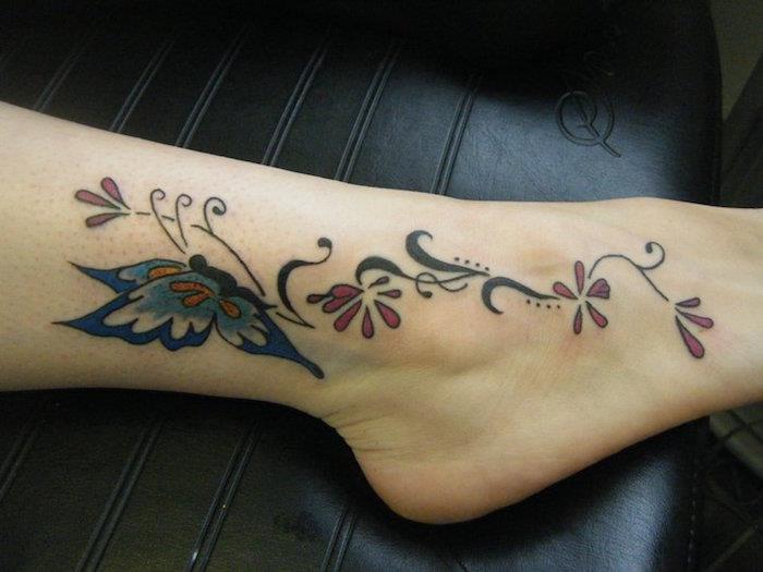 ponaredek tetovaža nestalni metulj črno rdeča barva leto mesec