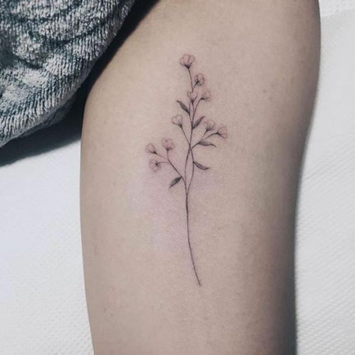 fiori-tattoo-idea-di dimensioni-ridotte-colorata-stilizzata-interno-braccio
