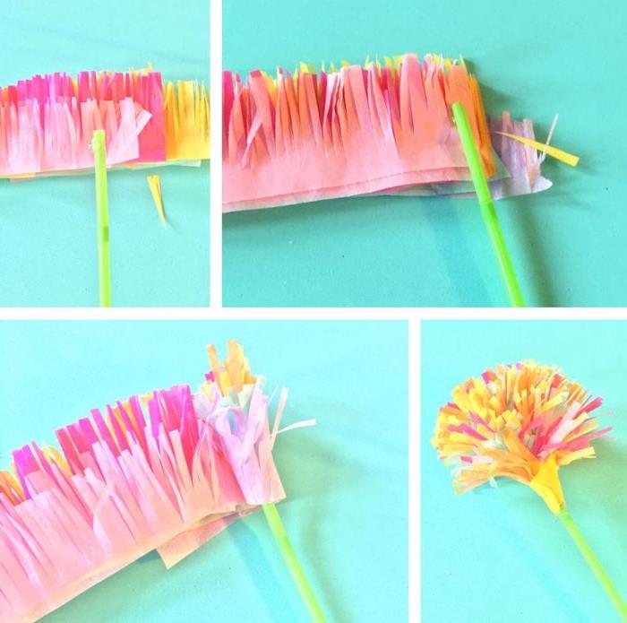 yeşil saman ve saçaklı kağıt mendil şeritlerinden yapılmış basit bir kağıt mendil çiçek örneği