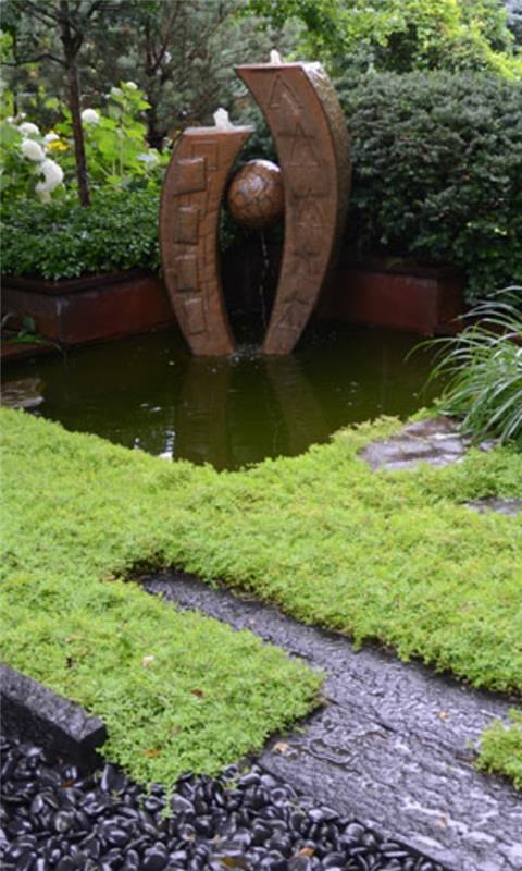 Japoniško stiliaus dizainas-sodas-fontanas akmenyje