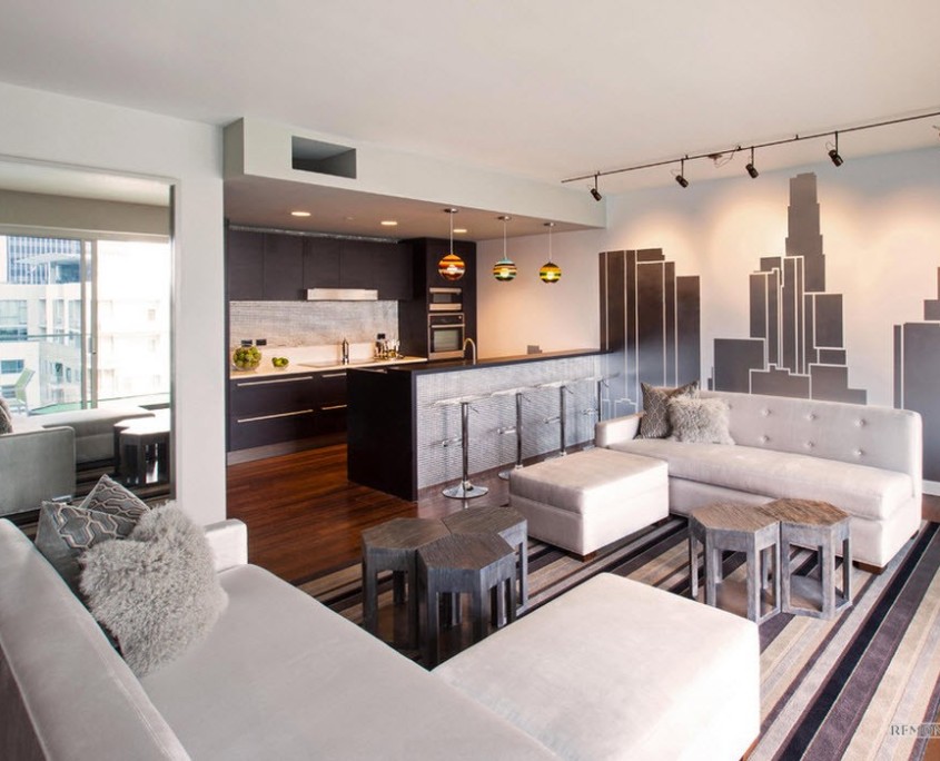 Casas em preto e branco no mural da parede da sala de estar