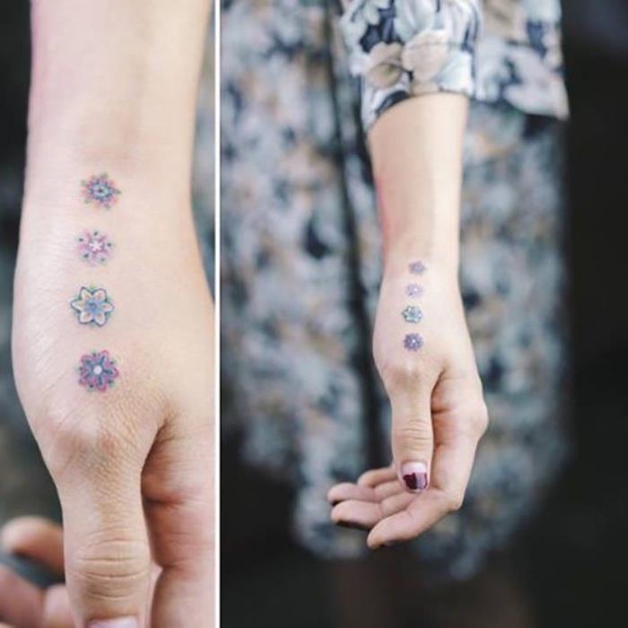keturios spalvingos gėlių rankos tatuiruotė, mažos tatuiruotės su prasme, moteris dėvi gėlėtą suknelę