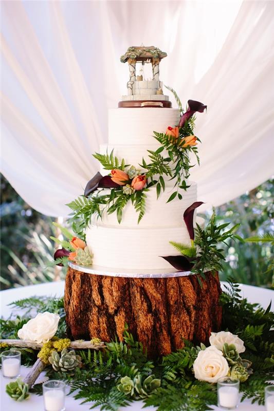 Gražus šalies vestuvių torto įvaizdis, kurį vestuvinių tortų papuošimą pasirinkti, paprasta obuolių apdaila, kaimiškas medinis vestuvinis tortas