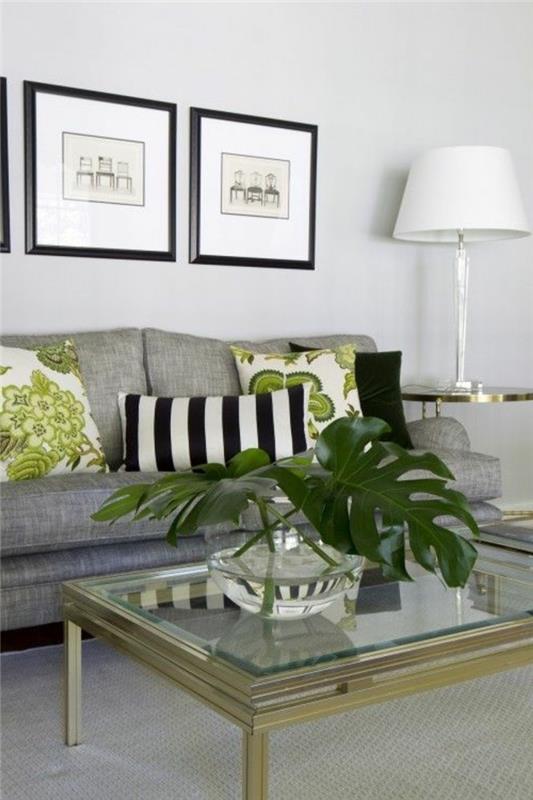 stiklinis kavos staliukas, pilka sofa, žalia gėlių, mesti pagalvės, kokios spalvos dera su pilka, įrėminta pakabinama dailė