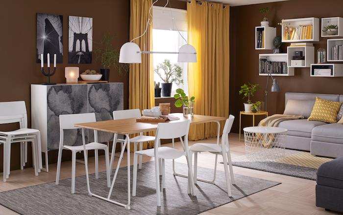 Uzun bir oturma odası nasıl düzenlenir dikdörtgen bir oturma odası nasıl düzenlenir yemek odası fonksiyonel uzun masa sandalyeler yemek odası gri kanepe sarı detaylar küçük oturma odası masası