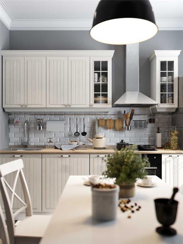 belo -siv model kuhinje s svetlo sivo barvo za stene in oblikovanjem bele opeke
