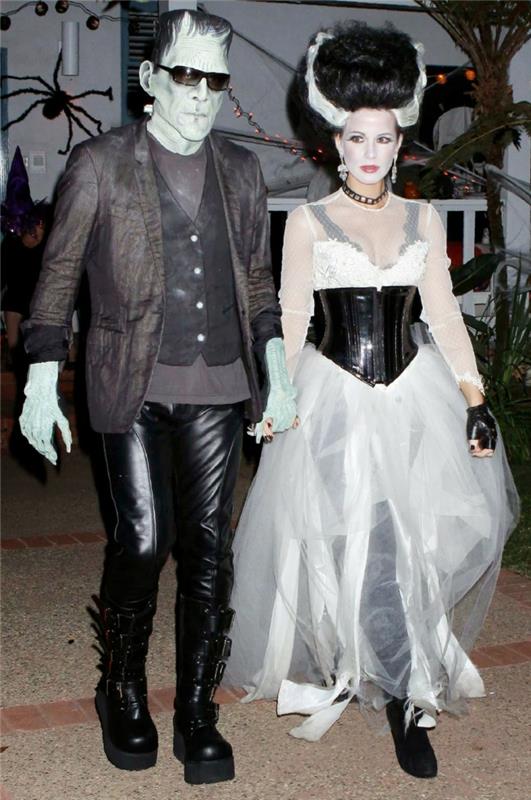 Helovino kostiumas porai, vyras su kelnėmis ir moteris su ilga balta suknele, veido kaukė, gausi šukuosena