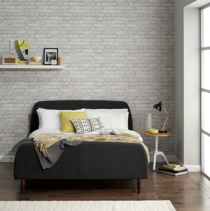 idėja-kaip papuošti skandinavišką miegamąjį-pilką dekorą-antracito-pilką-lovą-sieną-lentynas-kai kuriuos spalvų akcentus