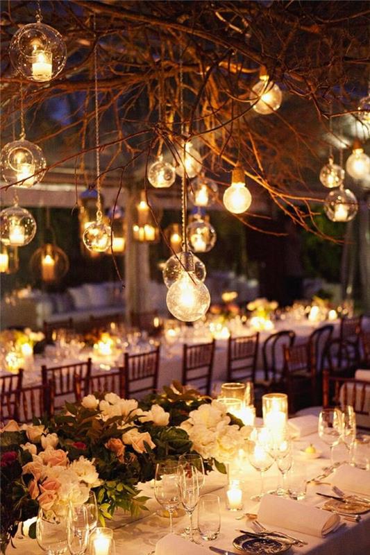 düğün-masa-dekorasyon-fikirleri-DIY-düğün-dekorasyon-fikirleri-toplar-ağaçlar-çiçekler-mumlar-sihir